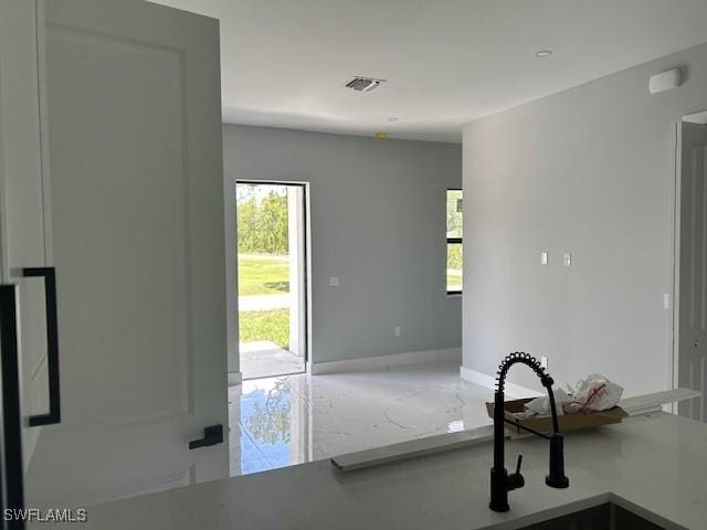 3501 E 10th St, Lehigh Acres, FL 33972 - kitchen featuring healthy amount of natural light