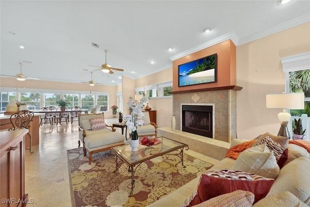 6120 Henderson Rd, Sanibel, FL 33957 - living area featuring crown molding, ceiling fan, a tile fireplace, recessed lighting, and vaulted ceiling
