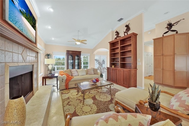6120 Henderson Rd, Sanibel, FL 33957 - living room featuring ornamental molding, recessed lighting, ceiling fan, lofted ceiling, and arched walkways