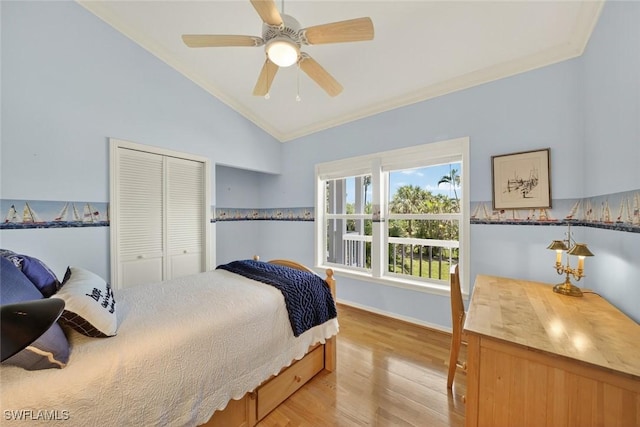 6120 Henderson Rd, Sanibel, FL 33957 - bedroom with vaulted ceiling, ornamental molding, light wood-type flooring, a closet, and a ceiling fan