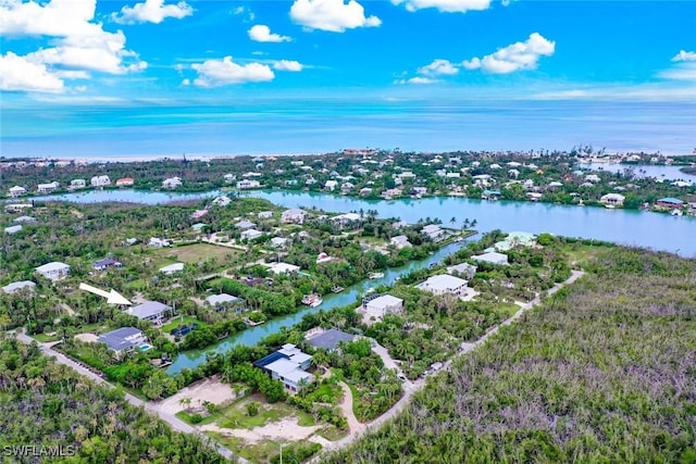 6120 Henderson Rd, Sanibel, FL 33957 - aerial perspective of suburban area with a nearby body of water