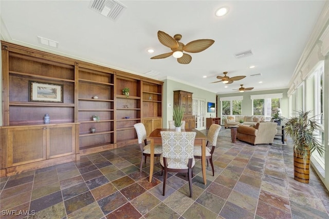 6120 Henderson Rd, Sanibel, FL 33957 - dining room with crown molding, a ceiling fan, stone tile flooring, and recessed lighting