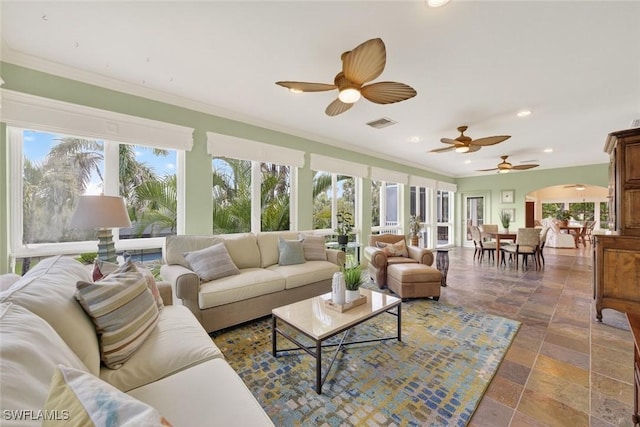 6120 Henderson Rd, Sanibel, FL 33957 - sunroom featuring healthy amount of natural light and arched walkways