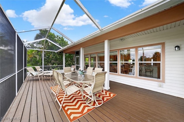 6120 Henderson Rd, Sanibel, FL 33957 - wooden deck featuring outdoor dining area and a lanai
