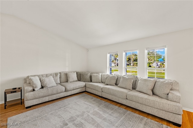 19897 Midway Blvd, Port Charlotte, FL 33948 - living area with wood finished floors and baseboards