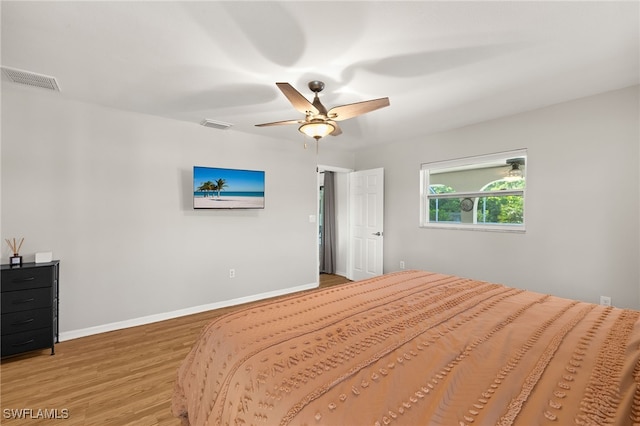 19897 Midway Blvd, Port Charlotte, FL 33948 - bedroom with light wood-type flooring and a ceiling fan