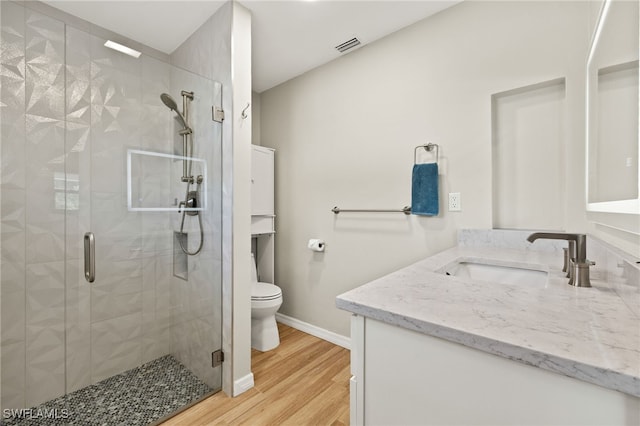 19897 Midway Blvd, Port Charlotte, FL 33948 - bathroom with vanity, a stall shower, and wood finished floors