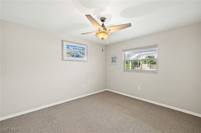 19897 Midway Blvd, Port Charlotte, FL 33948 - spare room featuring carpet flooring and ceiling fan