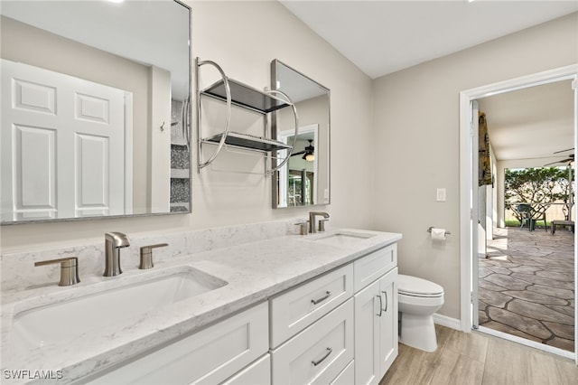 19897 Midway Blvd, Port Charlotte, FL 33948 - bathroom with double vanity and wood finished floors