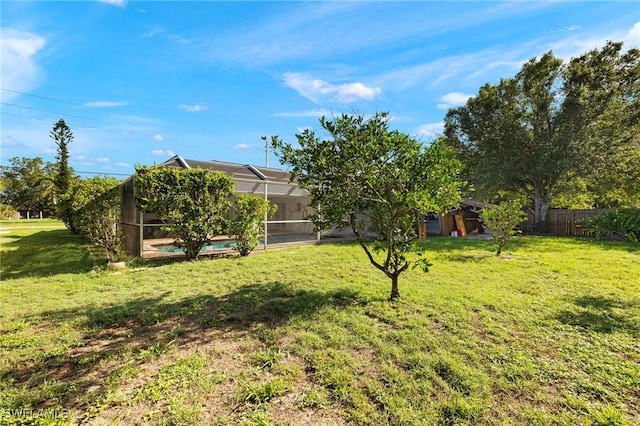 19897 Midway Blvd, Port Charlotte, FL 33948 - view of yard with a lanai