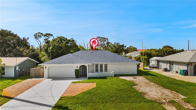 19897 Midway Blvd, Port Charlotte, FL 33948 - single story home featuring a front yard, a garage, driveway, and stucco siding