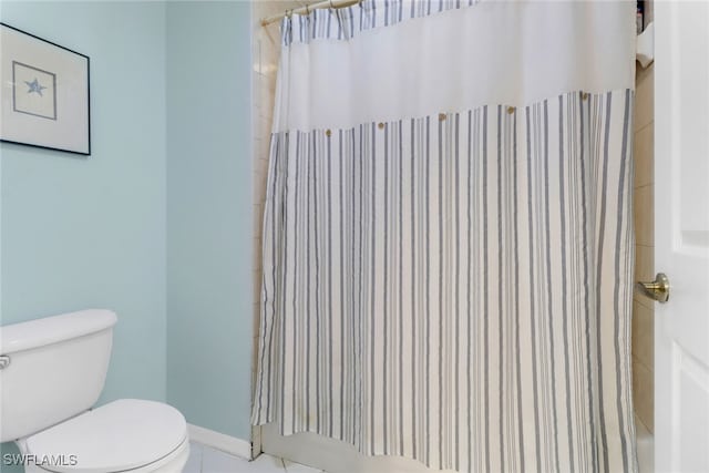 5730 Lago Villaggio Way, Naples, FL 34104 - bathroom featuring toilet and tile patterned floors
