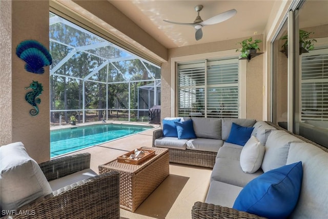 5730 Lago Villaggio Way, Naples, FL 34104 - outdoor pool featuring an outdoor living space, a patio area, ceiling fan, and glass enclosure