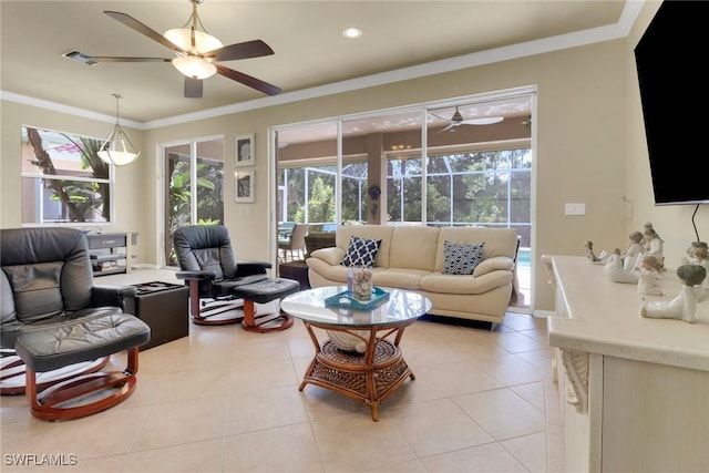 5730 Lago Villaggio Way, Naples, FL 34104 - living room with ceiling fan, healthy amount of natural light, ornamental molding, light tile patterned flooring, and recessed lighting
