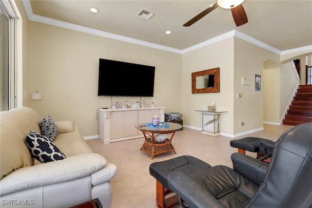 5730 Lago Villaggio Way, Naples, FL 34104 - living room featuring a ceiling fan, arched walkways, crown molding, recessed lighting, and light tile patterned floors