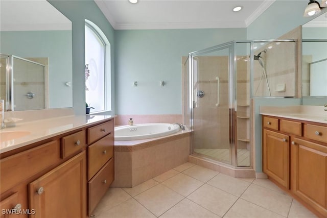5730 Lago Villaggio Way, Naples, FL 34104 - bathroom featuring two vanities, a shower stall, crown molding, tile patterned flooring, and a bath
