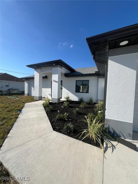 3206 28th St SW, Lehigh Acres, FL 33976 - exterior view of stucco siding