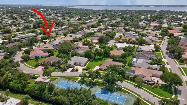 41 Timberland Cir S, Fort Myers, FL 33919 - aerial view of property and surrounding area featuring a nearby body of water and nearby suburban area