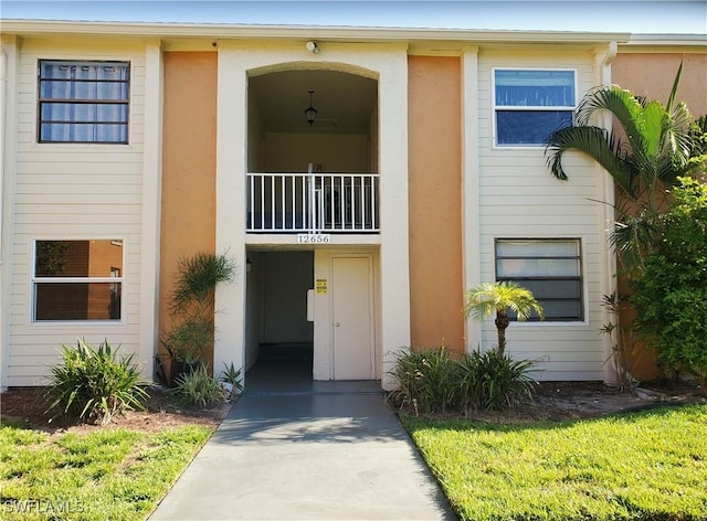 12656 Kenwood Ln Unit C, Fort Myers, FL 33907 - property entrance with stucco siding