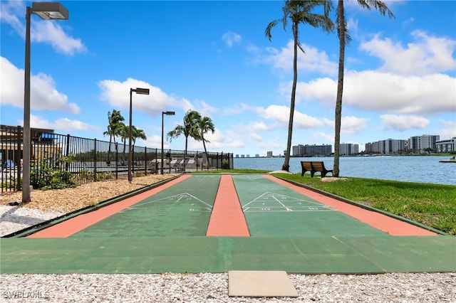 400 E Lenell Unit 110, Fort Myers Beach, FL 33931 - view of community with shuffleboard and a water view