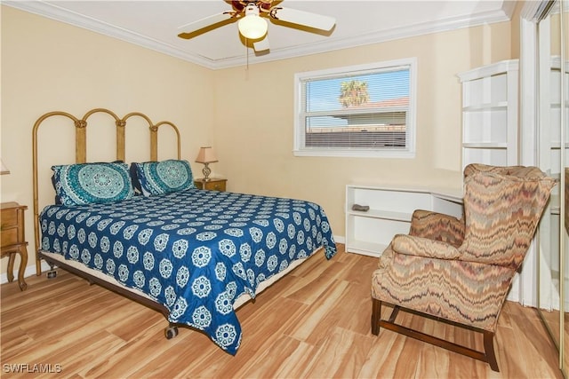 770 93rd Ave N, Naples, FL 34108 - bedroom featuring wood finished floors, ornamental molding, and ceiling fan