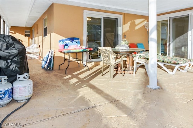 770 93rd Ave N, Naples, FL 34108 - view of patio / terrace with outdoor dining space