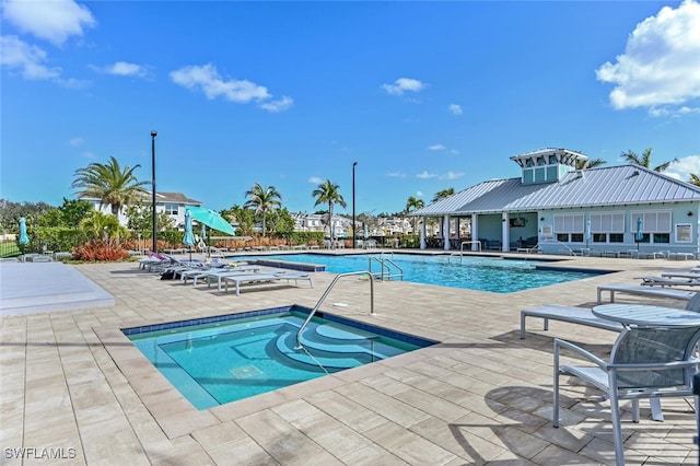4720 Arboretum Cir Unit 102, Naples, FL 34112 - community pool featuring a patio area