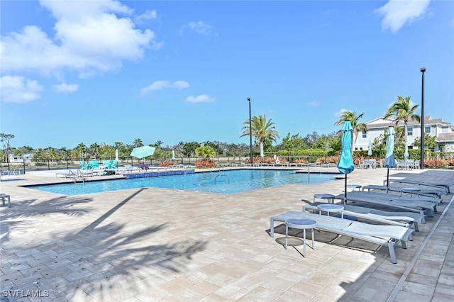 4720 Arboretum Cir Unit 102, Naples, FL 34112 - community pool with a patio
