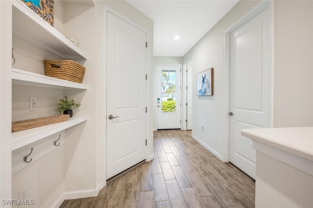 4720 Arboretum Cir Unit 102, Naples, FL 34112 - corridor featuring light wood-style floors and recessed lighting