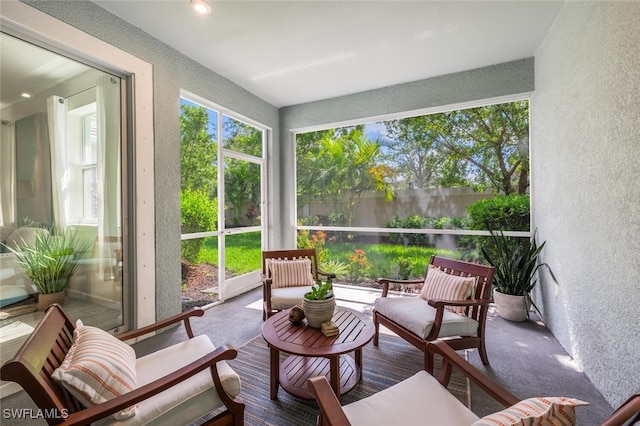 4720 Arboretum Cir Unit 102, Naples, FL 34112 - sunroom / solarium featuring a textured wall