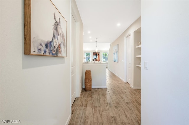 4720 Arboretum Cir Unit 102, Naples, FL 34112 - hallway featuring light wood finished floors and recessed lighting
