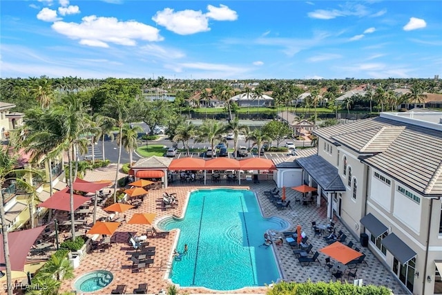 14581 Headwater Bay Ln, Fort Myers, FL 33908 - community pool featuring a patio area