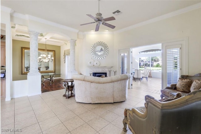 14581 Headwater Bay Ln, Fort Myers, FL 33908 - living area featuring ornate columns, light tile patterned flooring, ornamental molding, a ceiling fan, and a fireplace