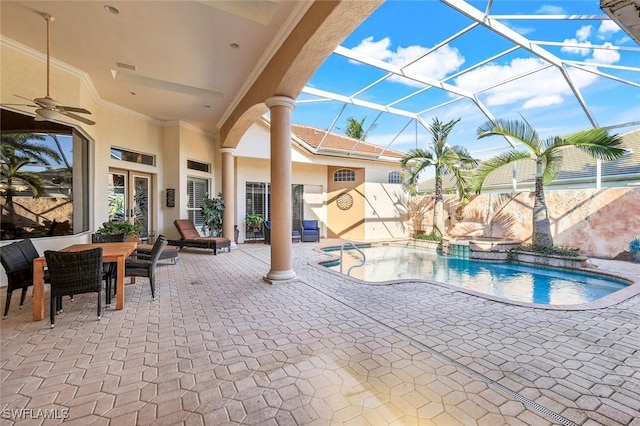 14581 Headwater Bay Ln, Fort Myers, FL 33908 - view of pool featuring a patio, a ceiling fan, and glass enclosure