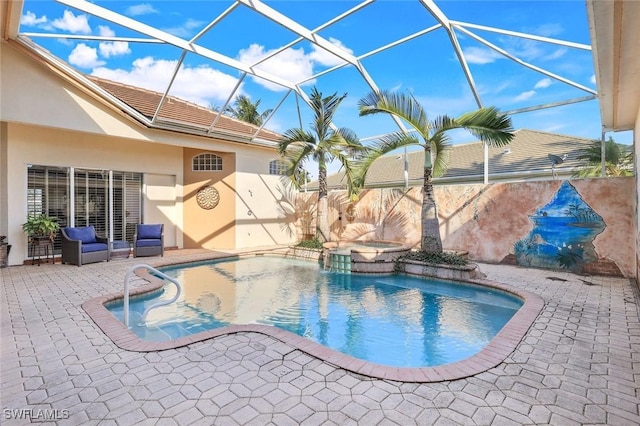 14581 Headwater Bay Ln, Fort Myers, FL 33908 - view of pool featuring a patio, a lanai, and a pool with connected hot tub