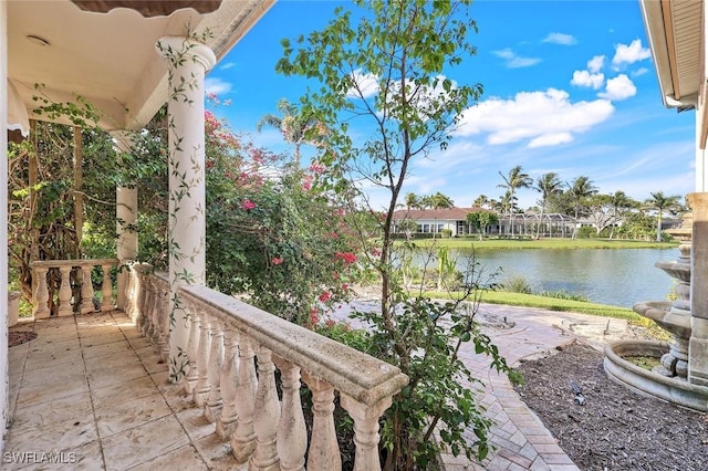 14581 Headwater Bay Ln, Fort Myers, FL 33908 - view of patio featuring a water view