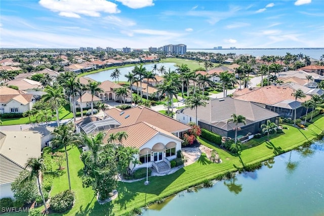 14581 Headwater Bay Ln, Fort Myers, FL 33908 - aerial perspective of suburban area with a large body of water
