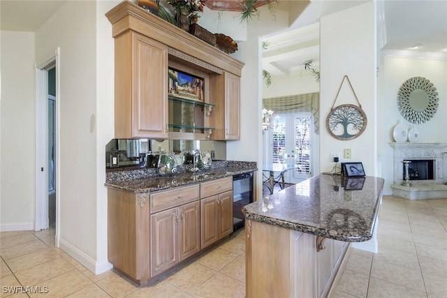 14581 Headwater Bay Ln, Fort Myers, FL 33908 - kitchen with dishwasher, french doors, light tile patterned floors, dark stone counters, and ornamental molding