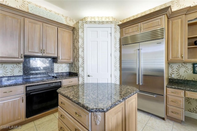 14581 Headwater Bay Ln, Fort Myers, FL 33908 - kitchen with black appliances, light tile patterned flooring, dark stone counters, open shelves, and a kitchen island