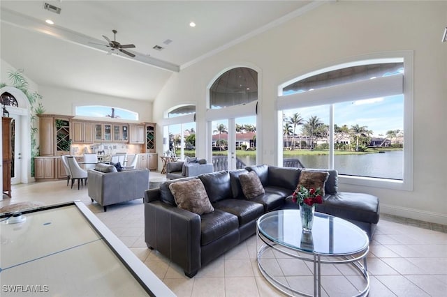 14581 Headwater Bay Ln, Fort Myers, FL 33908 - living area featuring a ceiling fan, light tile patterned floors, a water view, and ornamental molding