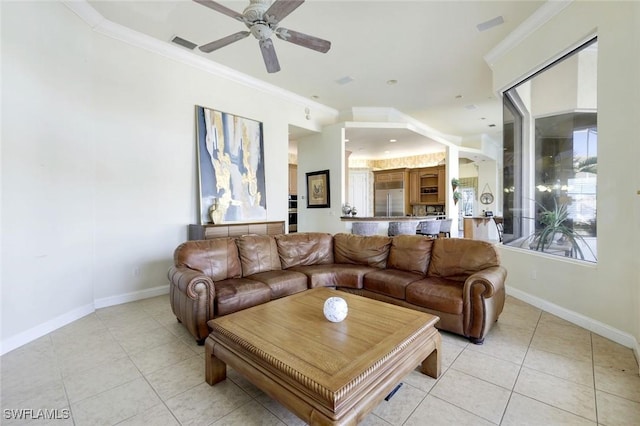 14581 Headwater Bay Ln, Fort Myers, FL 33908 - living room with light tile patterned floors, crown molding, and a ceiling fan