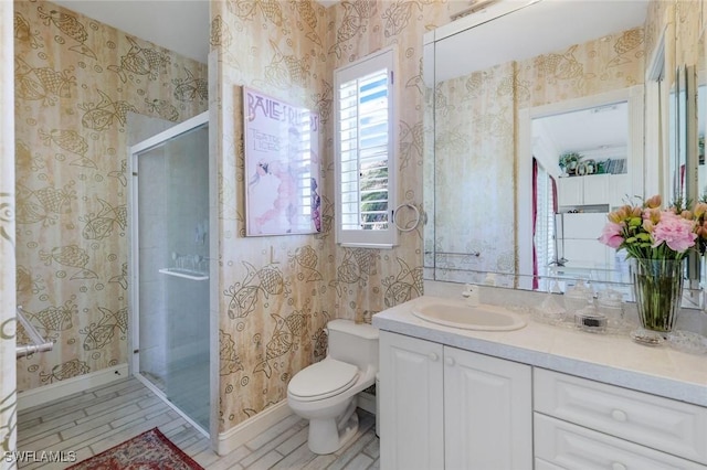 14581 Headwater Bay Ln, Fort Myers, FL 33908 - bathroom featuring wallpapered walls, vanity, and a stall shower