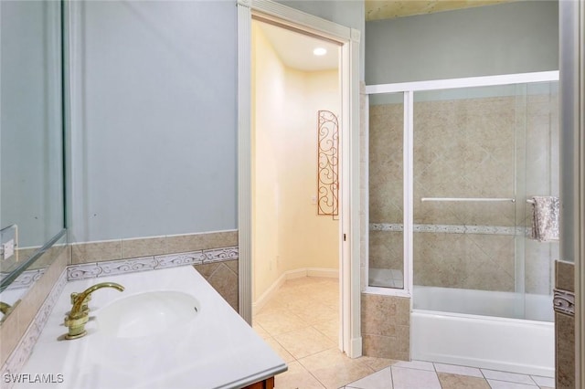 14581 Headwater Bay Ln, Fort Myers, FL 33908 - bathroom with vanity, tile patterned flooring, and enclosed tub / shower combo