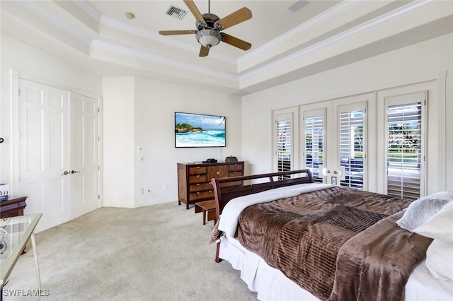 14581 Headwater Bay Ln, Fort Myers, FL 33908 - bedroom featuring a raised ceiling, crown molding, light colored carpet, french doors, and ceiling fan