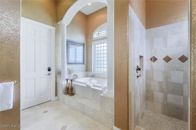 14581 Headwater Bay Ln, Fort Myers, FL 33908 - full bath featuring a bath, tiled shower, ornate columns, and tile patterned flooring