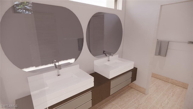 1021 Gaucho Ter, North Port, FL 34286 - bathroom featuring two vanities and tile patterned flooring