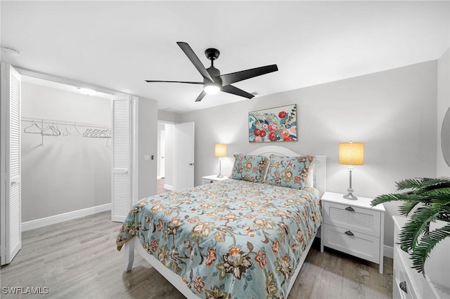 1138 Lucerne Ave, Cape Coral, FL 33904 - bedroom with wood finished floors, a closet, and a ceiling fan