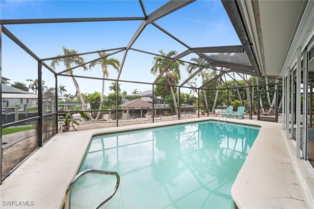 1138 Lucerne Ave, Cape Coral, FL 33904 - swimming pool featuring a patio area