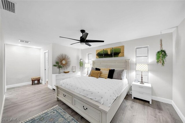 1138 Lucerne Ave, Cape Coral, FL 33904 - bedroom with wood finished floors and ceiling fan