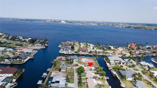 1138 Lucerne Ave, Cape Coral, FL 33904 - aerial view of property's location with a nearby body of water and nearby suburban area